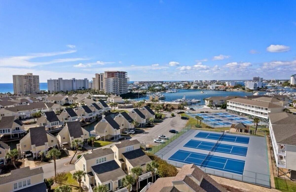 Photo 23 of Coastal Charm, CANAL FRONT 🌴Condo, 5 Pools, Hot Tub, walk to beach Dog-Friendly!