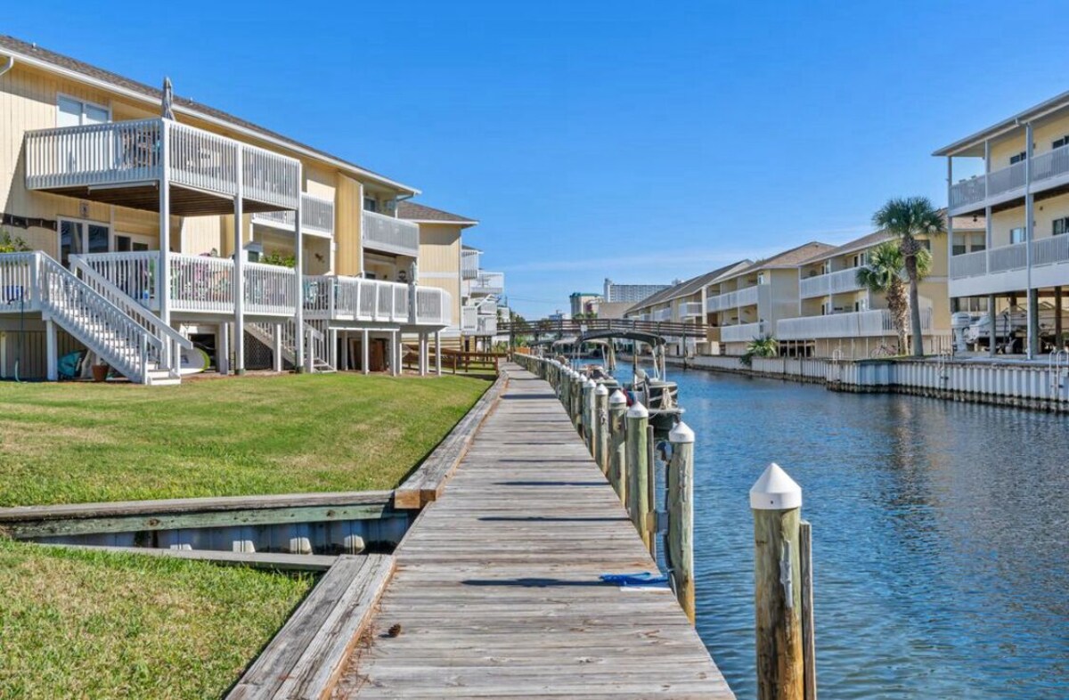 Photo 20 of Coastal Charm, CANAL FRONT 🌴Condo, 5 Pools, Hot Tub, walk to beach Dog-Friendly!