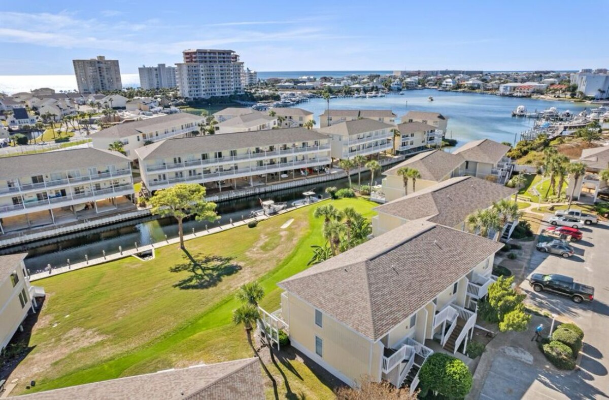Photo 12 of Coastal Charm, CANAL FRONT 🌴Condo, 5 Pools, Hot Tub, walk to beach Dog-Friendly!