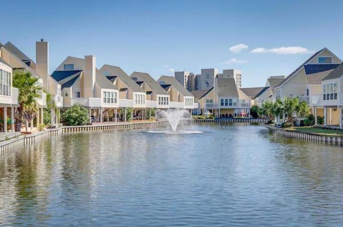 Photo 33 of Coastal Charm, CANAL FRONT 🌴Condo, 5 Pools, Hot Tub, walk to beach Dog-Friendly!