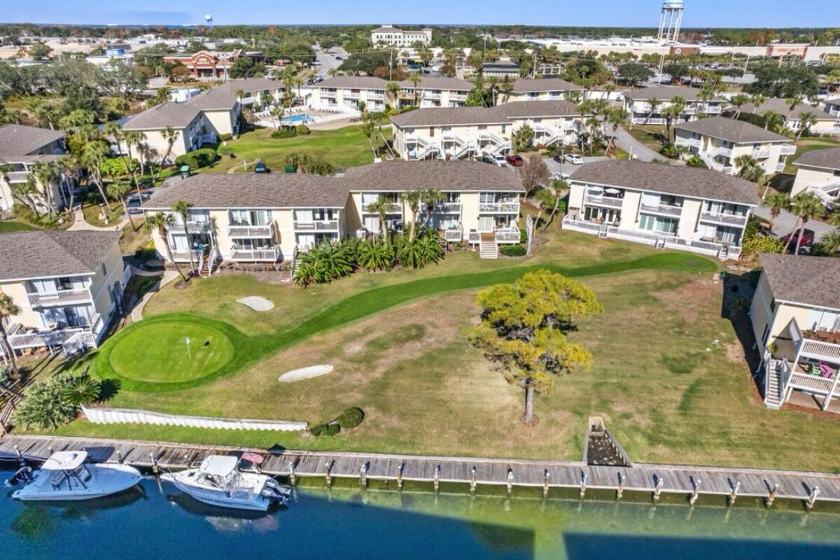 Photo 40 of Coastal Charm, CANAL FRONT 🌴Condo, 5 Pools, Hot Tub, walk to beach Dog-Friendly!