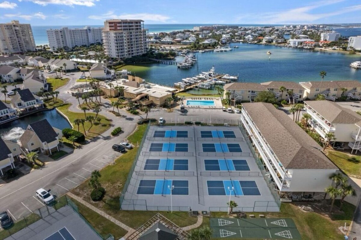 Photo 38 of Coastal Charm, CANAL FRONT 🌴Condo, 5 Pools, Hot Tub, walk to beach Dog-Friendly!