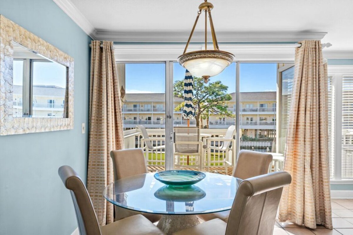 Photo 3 of Coastal Charm, CANAL FRONT 🌴Condo, 5 Pools, Hot Tub, walk to beach Dog-Friendly!