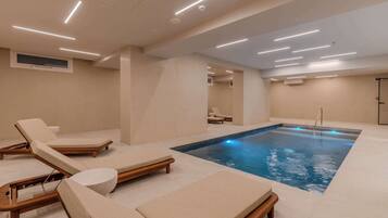 Indoor pool, seasonal outdoor pool, pool umbrellas, sun loungers