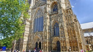 A historic cathedral with twin towers, large stained glass windows, and a central entrance. - 4, 35 Fossgate · Cosy Central 2-Bed Home Right in the Heart of York - Pass the Keys (York)