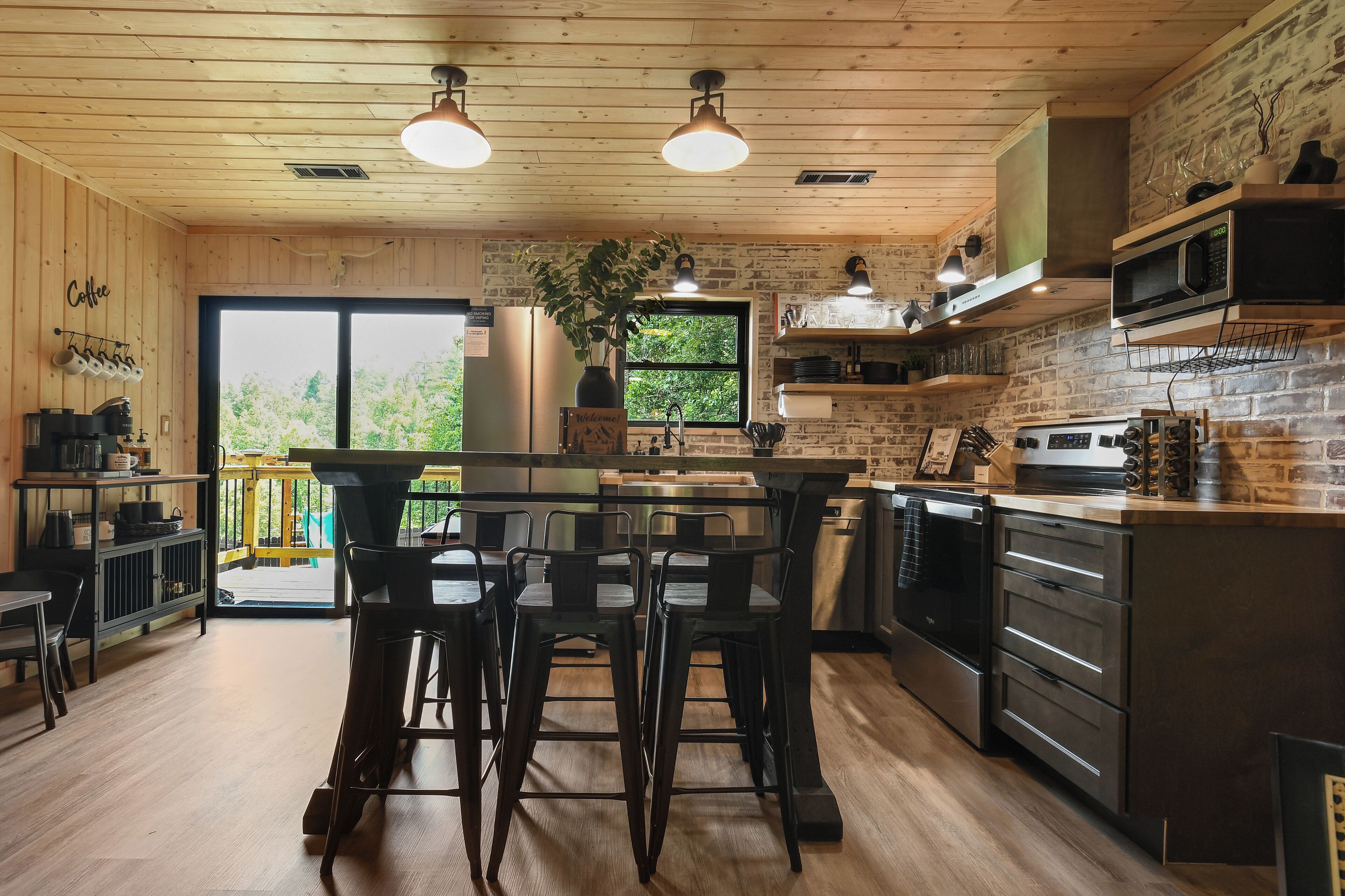 Coffee/tea maker, fridge, microwave, oven