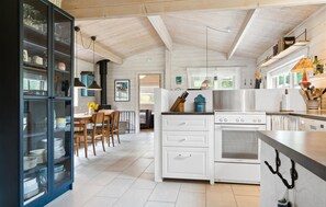 Fridge, stovetop, dishwasher, coffee/tea maker