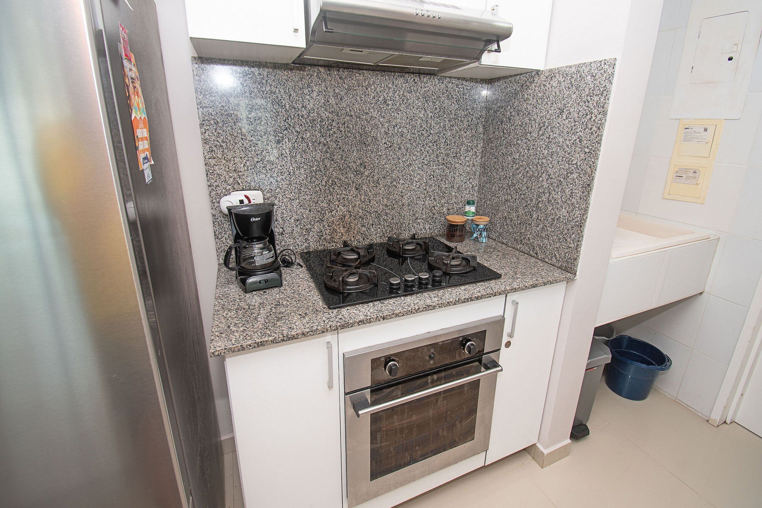 Apartment | Private kitchen | Espresso maker, coffee/tea maker, full-size fridge, microwave