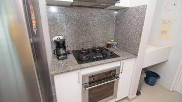 Apartment | Private kitchen | Espresso maker, coffee/tea maker, full-size fridge, microwave