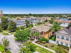 A residential area with houses, streets, and greenery.