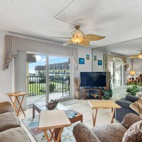 Condo, Multiple Beds, Balcony, Pool View (Sea Turtle Cove at Cocoa Beach) | Living area | 42-inch flat-screen TV with digital channels, TV