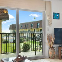 Condo, Multiple Beds, Balcony, Pool View (Sea Turtle Cove at Cocoa Beach) | Interior