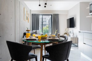 Apartamento Deluxe | Comedor