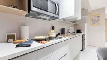 Appartement Deluxe, patio | Cuisine privée