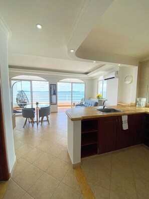 Apartment, 2 Bedrooms | Living area | 41-inch TV with satellite channels - U-GO Edificio Playa Mar en El Laguito (Cartagena)