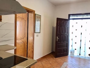 Traditional Quadruple Room, 1 Bedroom, Balcony, City View | Living area