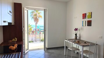 Standard Apartment, Balcony, Beach View | Private kitchen
