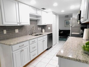 Private kitchen - Charming 2-bedroom/2.5 bath home, steps from ocean in enjoyable Melbourne Beach. (Melbourne Beach)