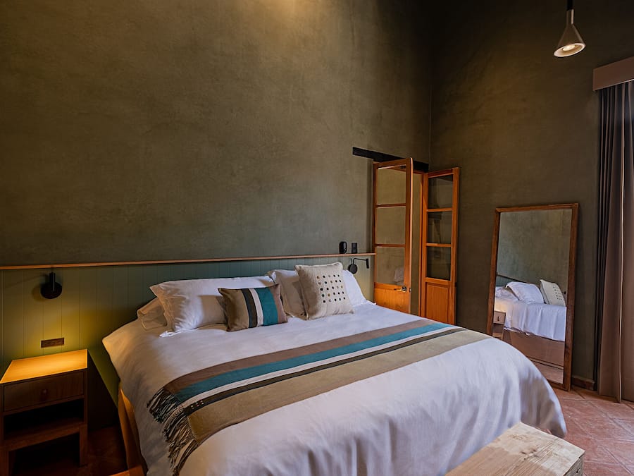 Luxury Studio Suite, Courtyard View | In-room safe, desk, laptop workspace, blackout drapes