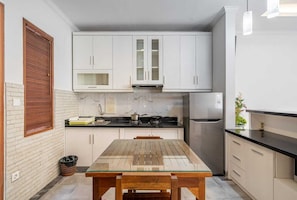 Villa superior, vistas al jardín | Cocina privada