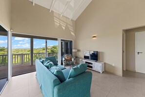 Villa, Patio, Park View | Living area | 60-inch LCD TV with satellite channels - Jan Thiel Jewel (Jan Thiel)