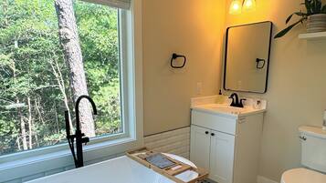 Shower, towels, soap, toilet paper