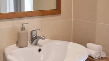 Hair dryer, towels, soap, toilet paper