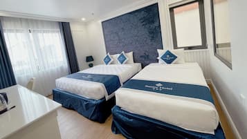 Standard Triple Room, City View | Premium bedding, minibar, desk, laptop workspace