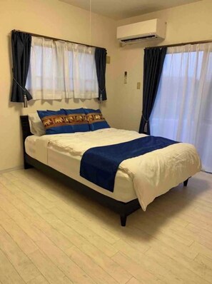 2 dormitorios, tabla de planchar con plancha, wifi gratis y ropa de cama
