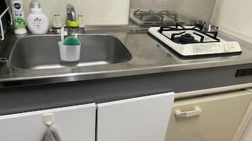Fridge, microwave, stovetop, cookware/dishes/utensils
