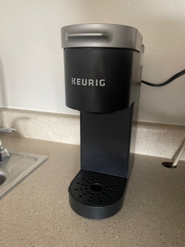 A Keurig coffee machine on a kitchen counter.