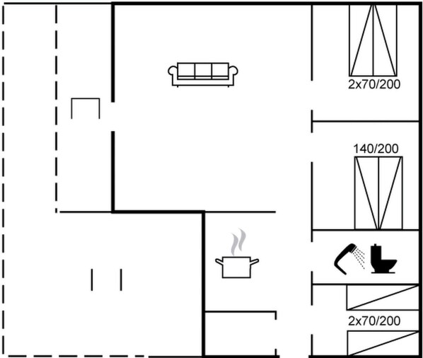 A floor plan with a kitchenette, a sofa, and a toilet.