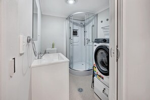 Shower, hair dryer, towels