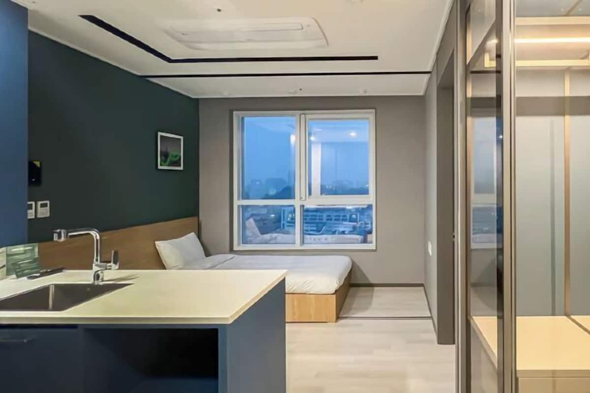 Desk, laptop workspace, free WiFi, bed sheets