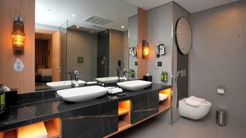 Shower, hair dryer, slippers, towels