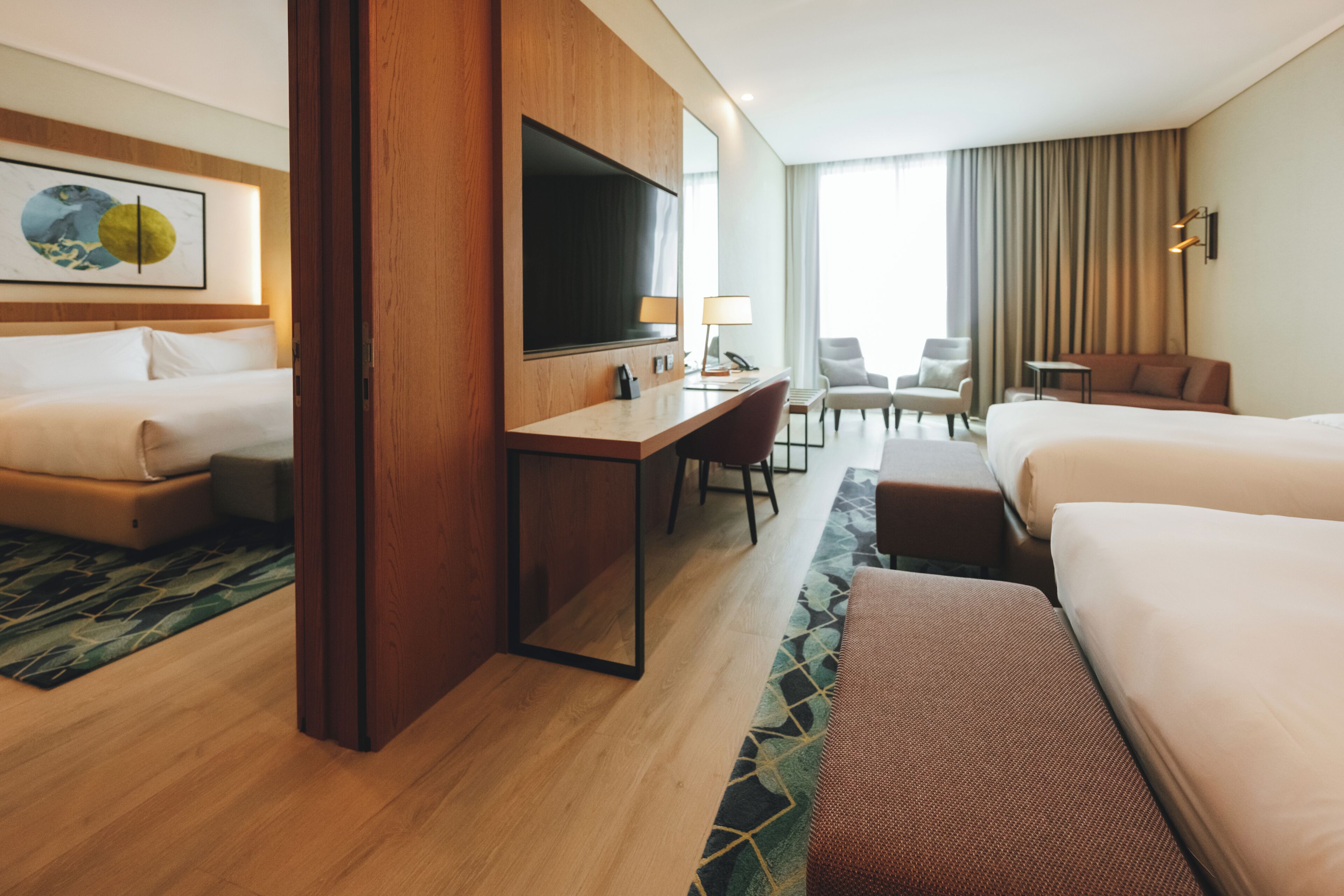 Family Room, Multiple Beds | Minibar, soundproofing, iron/ironing board, free cribs/infant beds