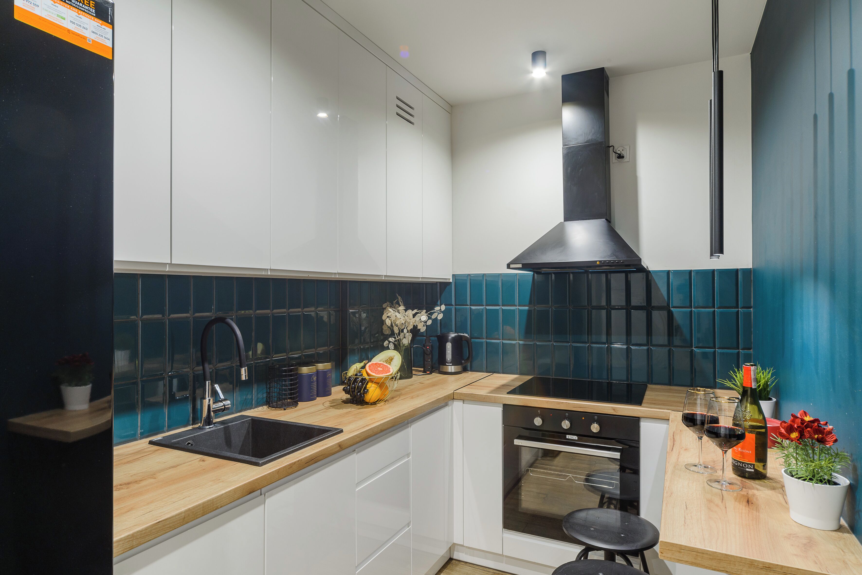 Superior Apartment, Balcony, Courtyard View | Private kitchen | Electric kettle, griddle, cleaning supplies, paper towels