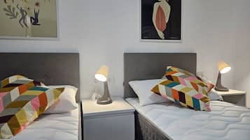 3 dormitorios, tabla de planchar con plancha, wifi gratis y ropa de cama
