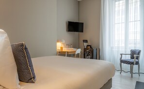 Ropa de cama de alta calidad y minibar