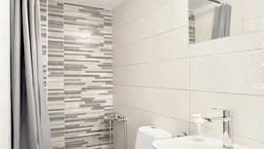 A modern bathroom with a shower, toilet, and sink. - Seagull by halu! (Katerini)