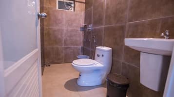 Shower, hydromassage showerhead, towels