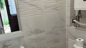 Hair dryer, towels, soap, shampoo