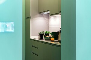 Apartment, Pool View | Private kitchen | Full-size fridge, microwave, stovetop, dishwasher