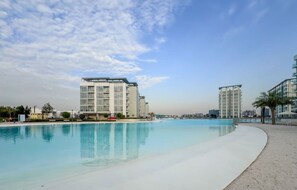 1 bedroom - Manzil - 1BR Home District One Lagoon View (Dubai)