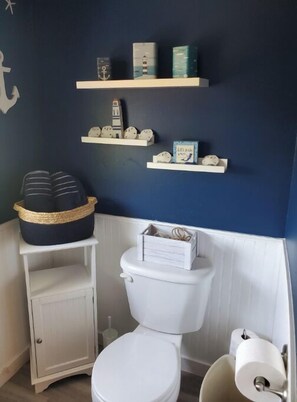 Shower, towels, soap, toilet paper