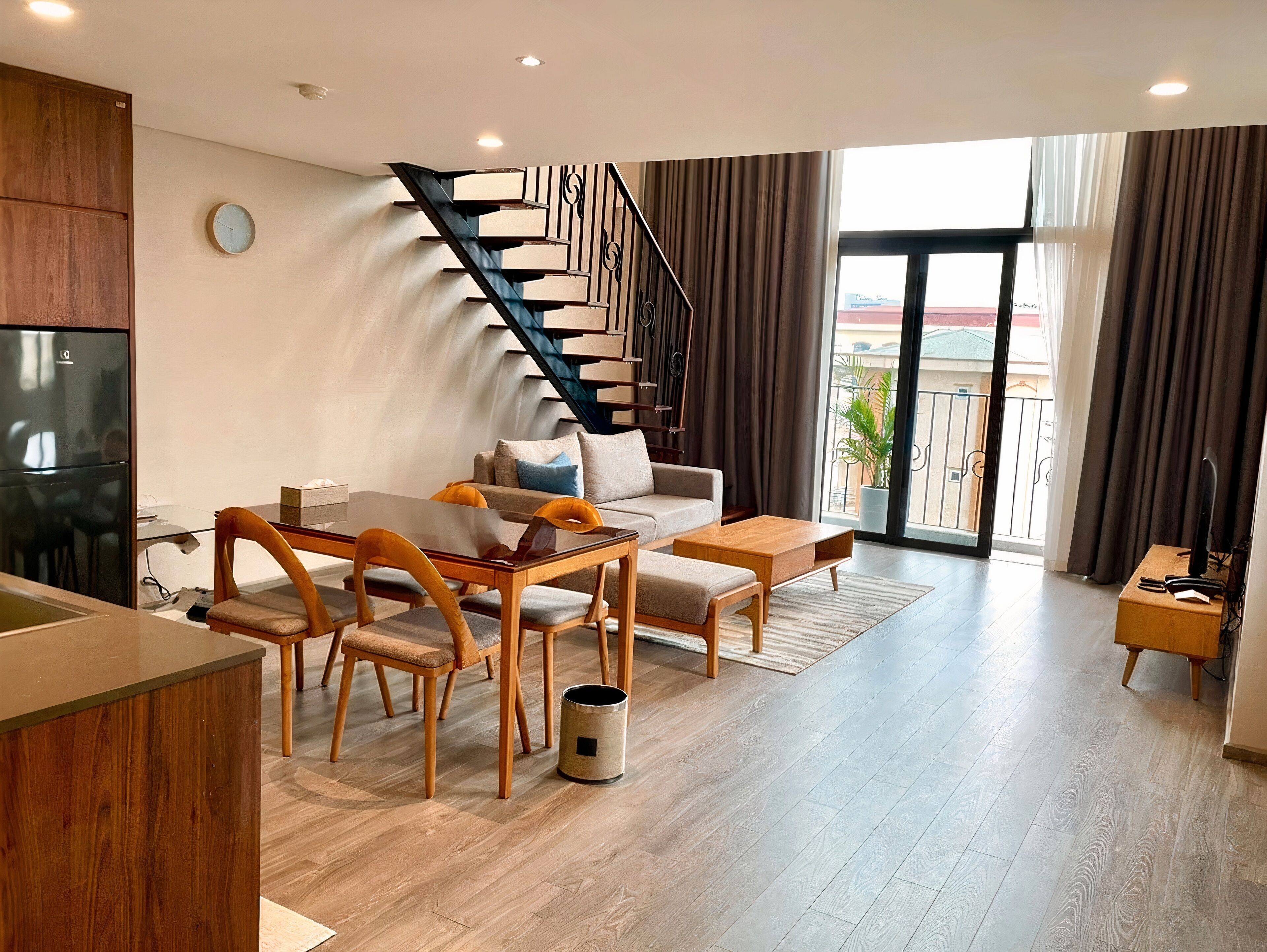 Deluxe Apartment | Living area | 50-inch Smart TV with digital channels