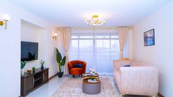 Deluxe Apartment, Balcony, City View | Living area