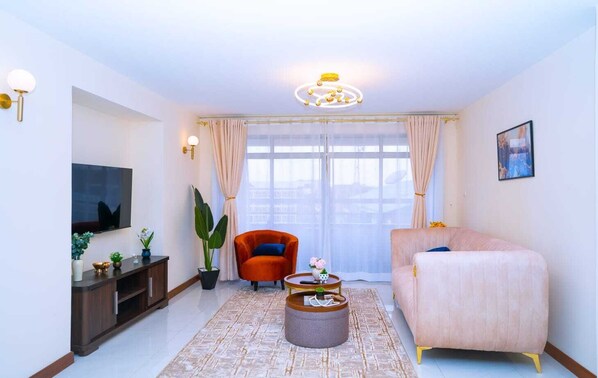 Deluxe Apartment, Balcony, City View | Living area - Lux Suites Morningside Greens Apartments (Nairobi)