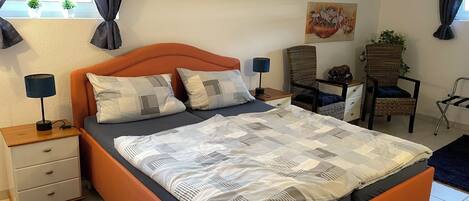 1 bedroom, desk, iron/ironing board, travel cot