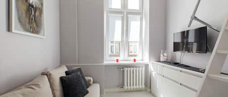 Signature Apartment | Living area | Flat-screen TV